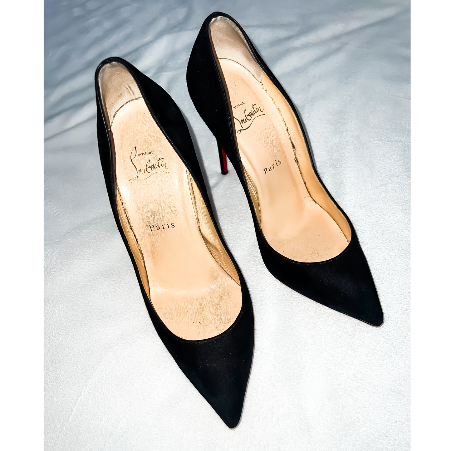 Christian Louboutin Heels
(Size 38)