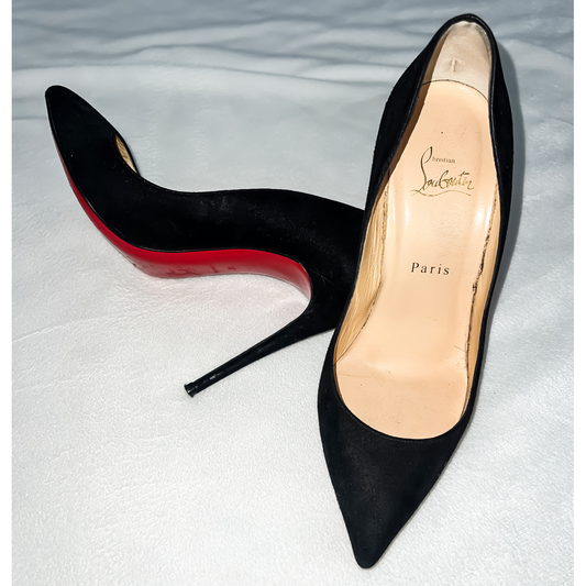 Christian Louboutin Heels
(Size 38)